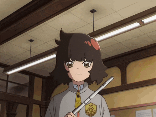 a girl in a school uniform holds a flute in her hand