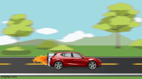 a red car is driving down a road with a fire coming out of it