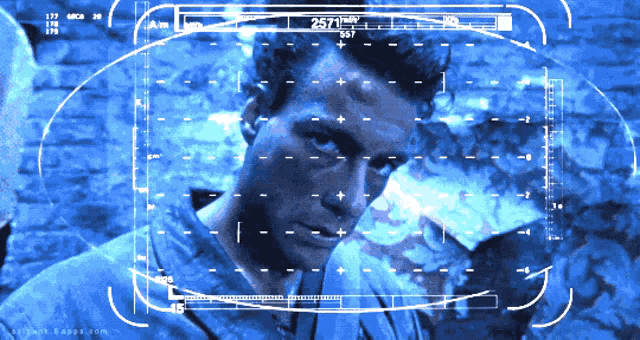 a computer screen shows a man 's face and says 257 12w on it