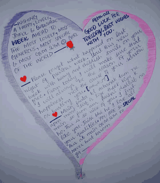 a heart shaped piece of paper with writing on it