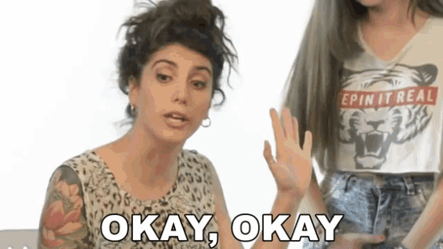 a woman in a leopard print top says okay
