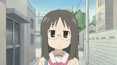 a cartoon girl wearing glasses is standing on a sidewalk .