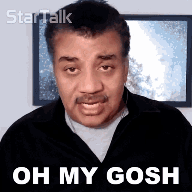 a man with a mustache says oh my gosh in front of a picture