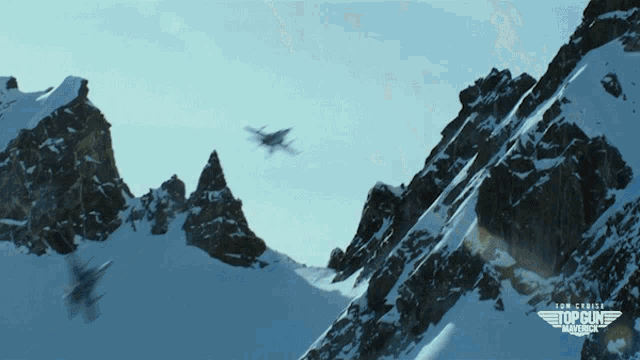 a poster for top gun maverick shows planes flying over snowy mountains
