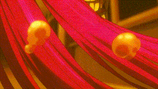 a close up of a cartoon character 's face with pink hair and a yellow mask .
