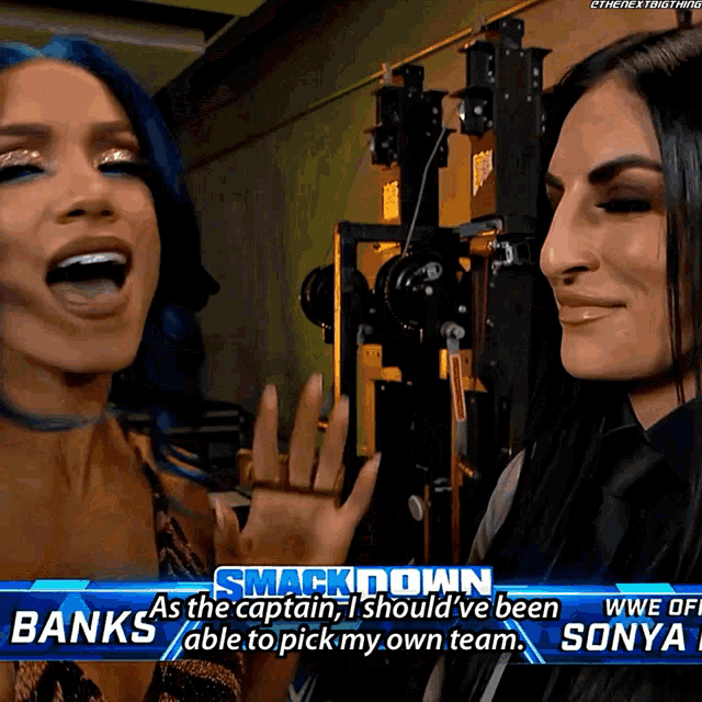 two women are on a smack down show and one of them is talking about being able to pick her own team