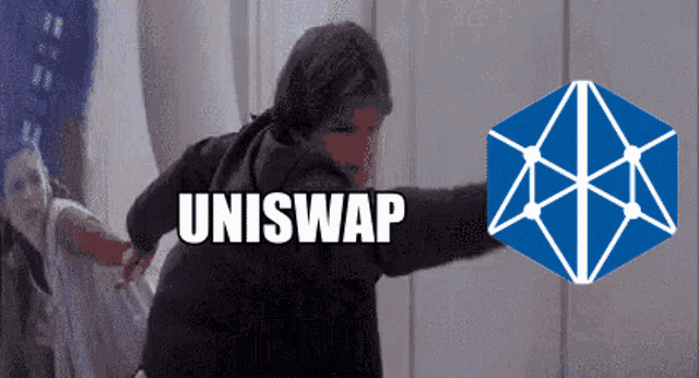 a man in a black jacket is standing in front of a blue cube that says uniswap
