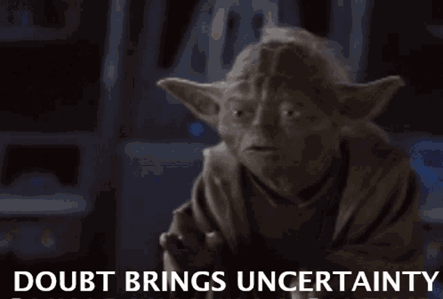 a picture of yoda with the words " uncertainty breeds fear " above him