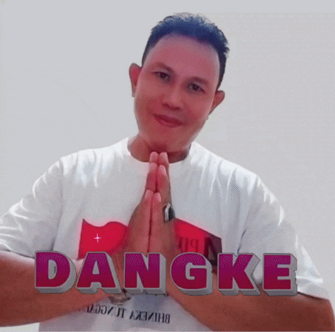 a man wearing a white shirt with the word dangke on the front