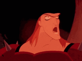 a cartoon character with long red hair and a black hat is making a face .