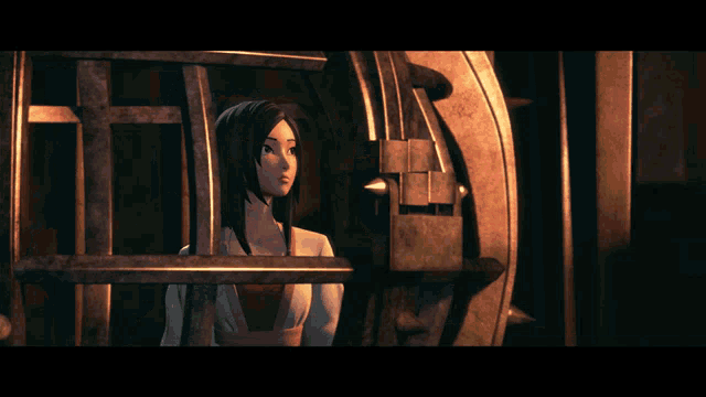 a woman is behind bars in a dark room looking out
