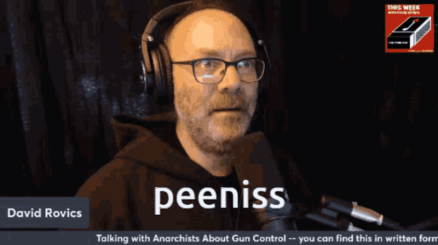 a man with glasses and headphones is talking about gun control