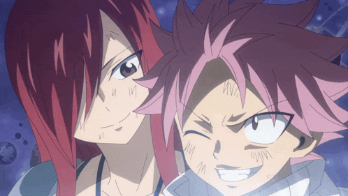 a girl with red hair and a boy with pink hair