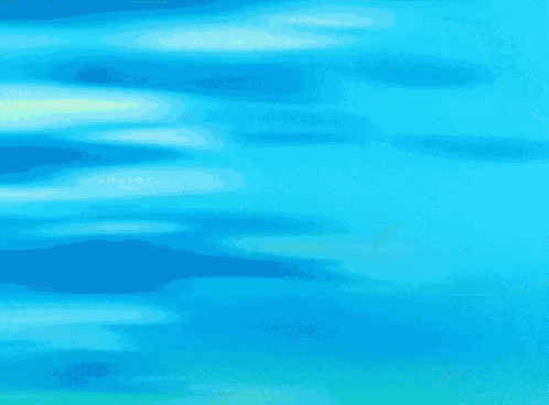a cartoon girl with green hair is standing in front of a blue sky with her hand on her chin .