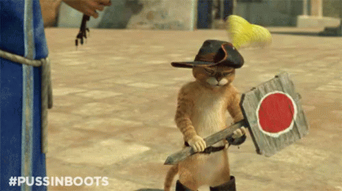 Smile GIF - Puss In Boots Smile Smirk GIFs