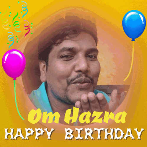 a man blowing a kiss in front of balloons that say happy birthday