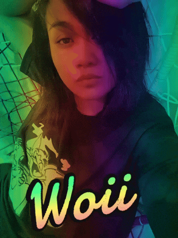 a woman taking a selfie with the name woii on her shirt