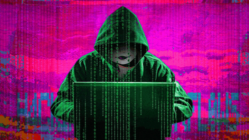 a person in a green hoodie is holding a laptop with the word hacking written in white letters