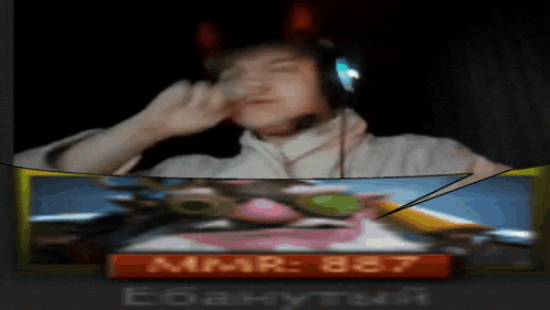 a blurry image of a man wearing headphones and a sign that says mr 887