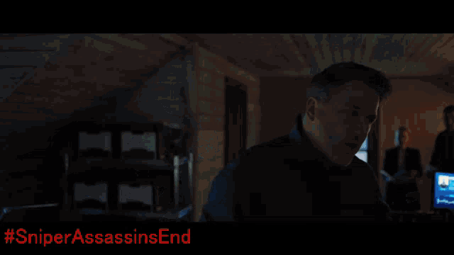 an ad for sniper assassins end shows a man in a plaid shirt and hat