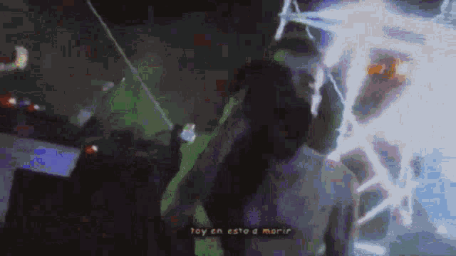 a man without a shirt is standing in front of a lightning strike and the words toy en esto a morir are visible