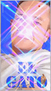 a recording of a man 's face with the word gato in the background