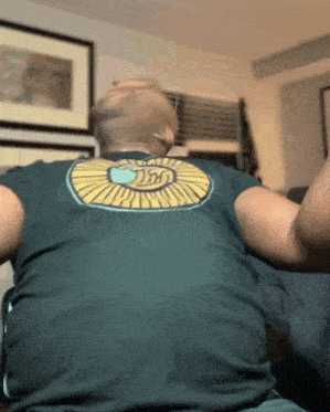 a man wearing a t-shirt that has the word cisco on it