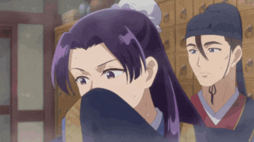 a woman with purple hair is covering her face while a man looks on