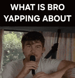 a man singing into a microphone with the words what is bro yapping about behind him