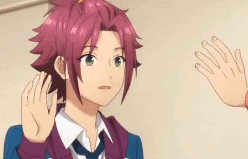 a girl with pink hair is being held by another girl