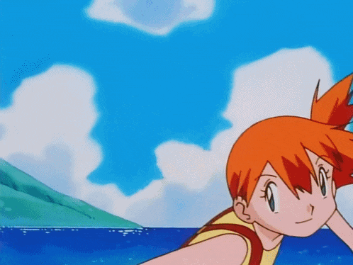 a girl with orange hair is standing in front of the ocean