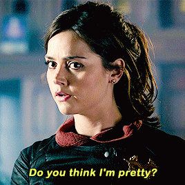 a woman says do you think i 'm pretty while wearing a leather jacket
