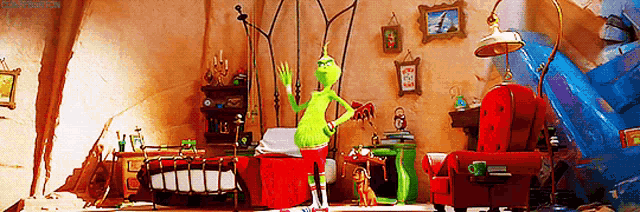 a cartoon character named grinch is standing in a room with a bed and a chair .