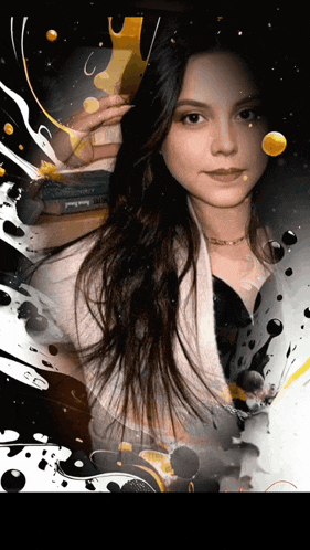 a woman 's face is surrounded by a splash of paint and a book that says ' amanda ' on it