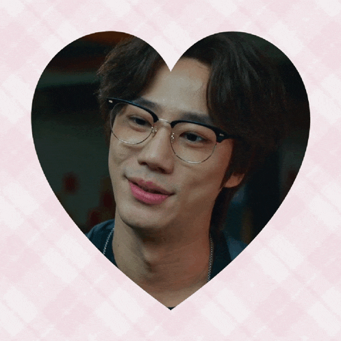 a man wearing glasses is surrounded by a heart