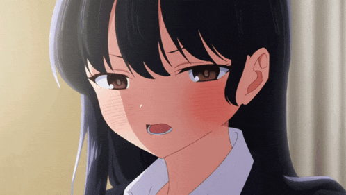 a close up of a girl 's face with dark hair