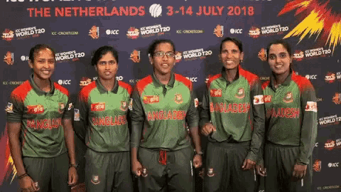 a group of female cricket players from bangladesh are posing for a photo