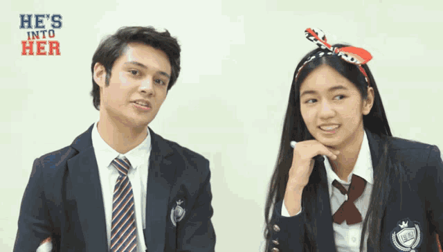 a man and a girl are standing next to each other with the words he 's into her behind them