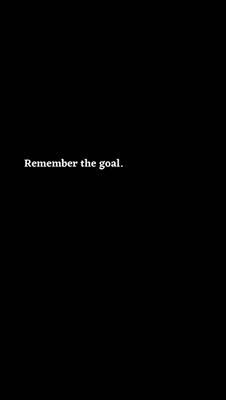 it says `` remember the goal '' on a black background .