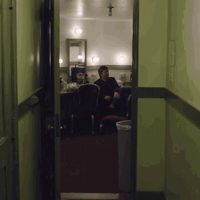 Laughing Noel Gallagher GIF - Laughing Noel Gallagher Lock All The Doors Song GIFs
