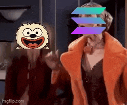 a woman in a fur coat is standing next to a cartoon character with a smiley face on it .