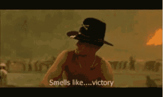 a man in a cowboy hat is talking about smelling like victory .