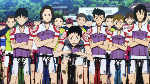 a group of cartoon characters are standing next to each other with one wearing a shirt that says ' tokyo ' on it