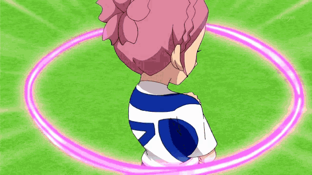 a girl in a blue and white uniform with the number 20 on it