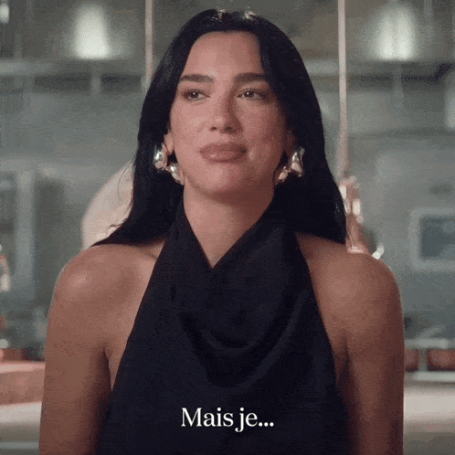 a woman in a black dress is saying mais je ...