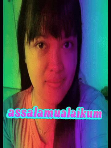a woman 's face with the words assalamualaikum written on it