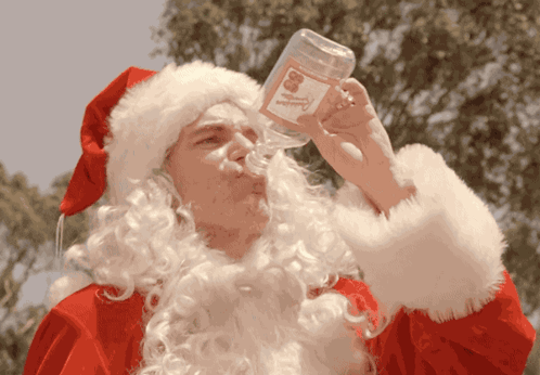 bad-santa-drinking.gif