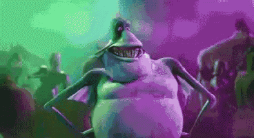 a cartoon character is standing in front of a crowd of people in a club .