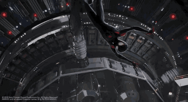 a man in a spiderman suit is flying through the air in a video game
