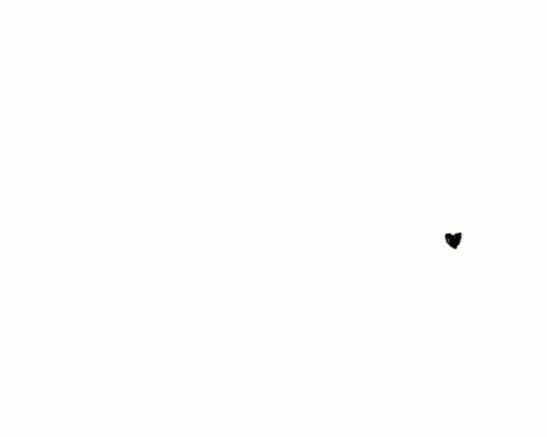 a pattern of black hearts on a white background .